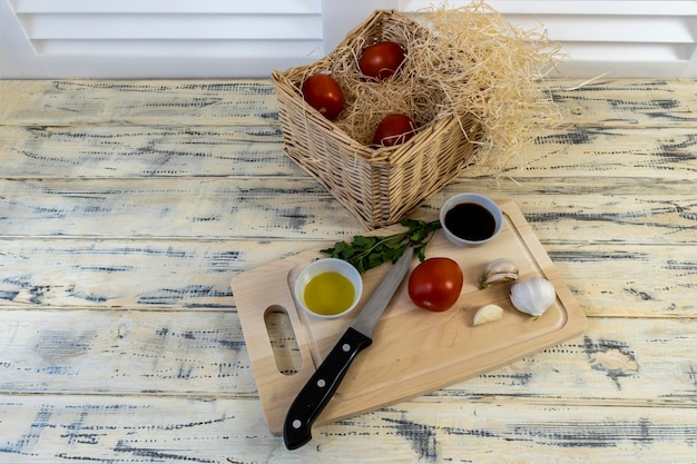 kitchen utensils and ingredients on wooden table